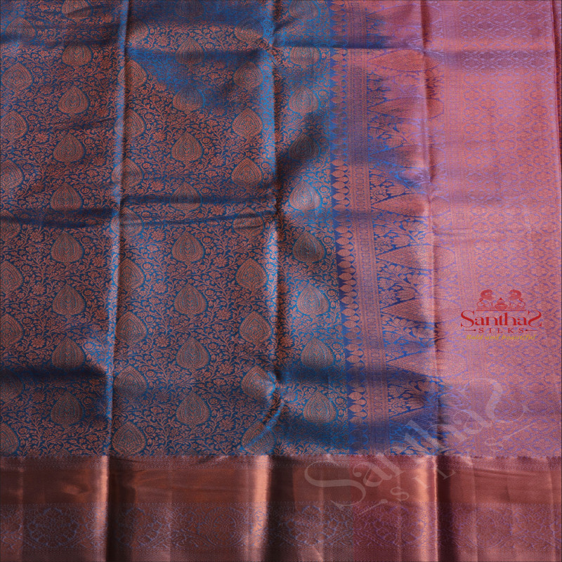 BLUE COLOUR BODY WITH JACQUARD FLORAL EMBOSED IN COPPER ZARI WITH CONTRAST BLOUSE & BORDER