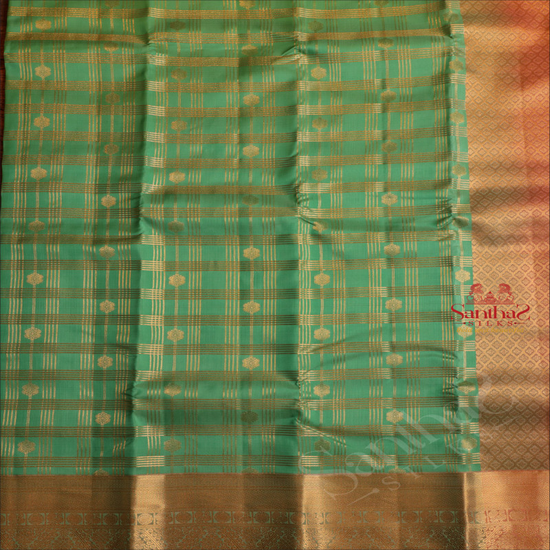 COOL GREEN COLOUR BODY WITH GOLDEN ZARI STRIPS & BUTTAS AND CONTRAST PALLU & BLOUSE