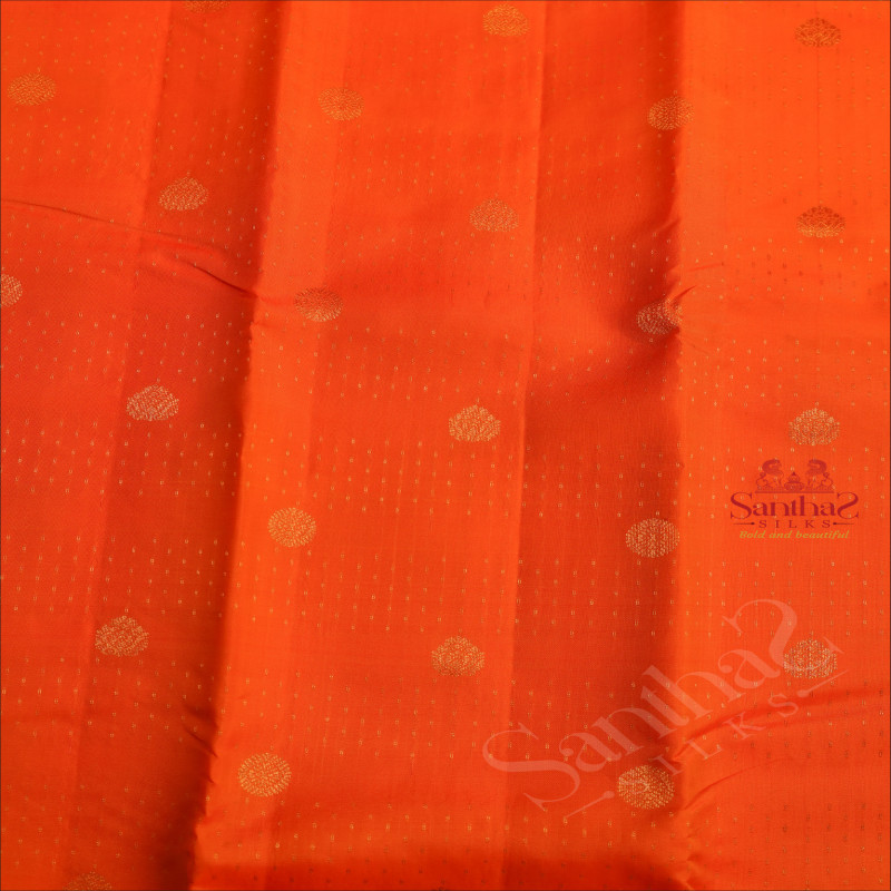 ORANGE COLOUR BODY WITH GOLDEN ZARI BUTTAS AND CONTRAST PEACOCK BLUR PALLU & BLOUSE
