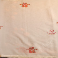 WHITE COLOUR CRUSH TISSUE SAREE WITH FANCY MOTIF WITH CONTRAST RED COLOUR DESIGN BLOUSE