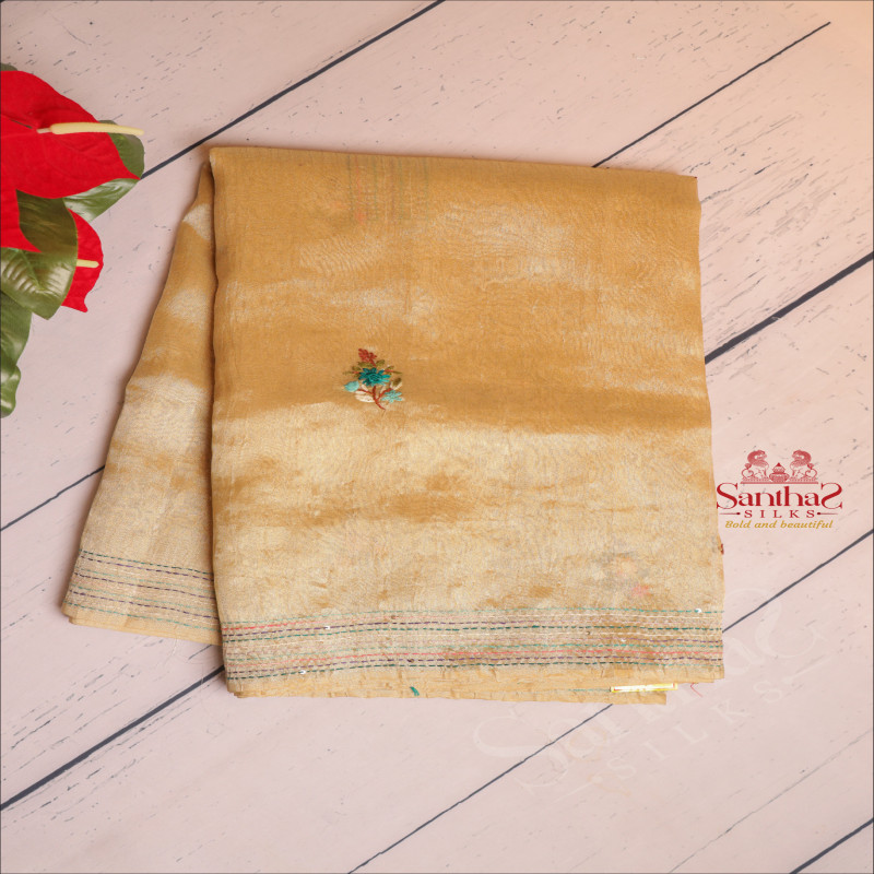  TISSUE SAREE WITH HAND EMBORIDERY WORK IN METALIC GOLD COLOUR
