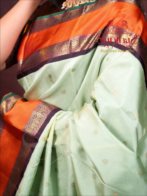 pastel-green-kanjivaram-silk-saree-with-rich-orange-border