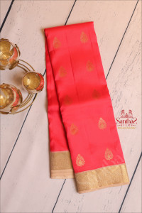 coral-red-colour-body-with-golden-zari-buttas-and-contrast-pallu-blouse
