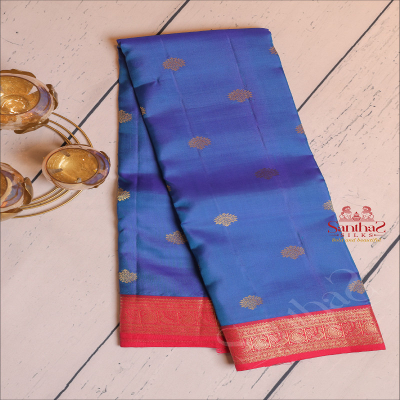 PEPSI BLUE COLOUR BODY WITH GOLDEN ZARI BUTTA WITH CONTRAST BLOUSE & BORDER