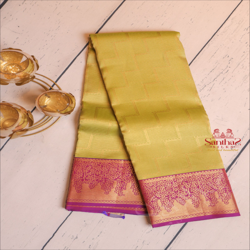 GREEN COLOUR BODY WITH GOLDEN FANCY EMBOSED WITH CONTRAST BLOUSE & BORDER