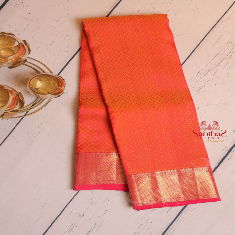 ORANGE COLOUR BODY WITH FANCY EMBOSED WITH CONTRAST BLOUSE & BORDER