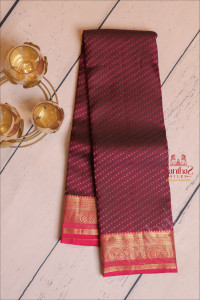 dark-magenta-colour-body-with-embosed-design-and-contrast-pallu-blouse