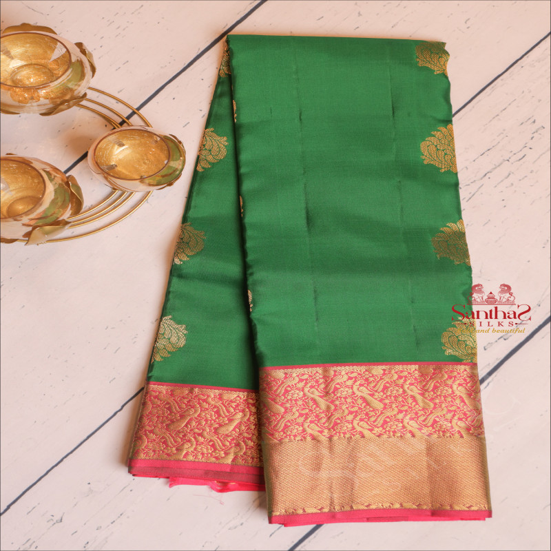 BOTTLE GREEN COLOUR BODY WITH GOLDEN ZARI FLORAL BUTTA WITH CONTRAST BLOUSE & BORDER