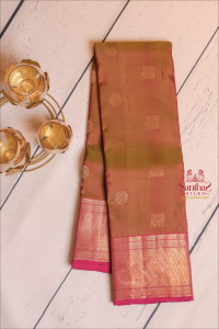 green-and-magenta-colour-mixed-body-with-peacock-chakra-motifs-and-contrast-pallu-blouse