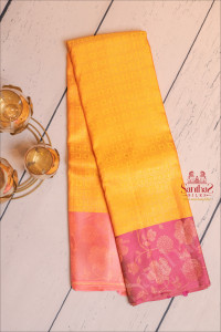 neon-yellow-colour-body-with-copper-zari-fancy-design-and-contrast-pallu-blouse