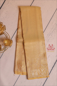 borderless-pastel-yellow-colour-body-with-silver-zari-fancy-designs-and-self-pallu-blouse