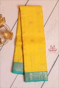 lemon-yellow-colour-body-with-golden-zari-buttas-and-contrast-pallu-blouse
