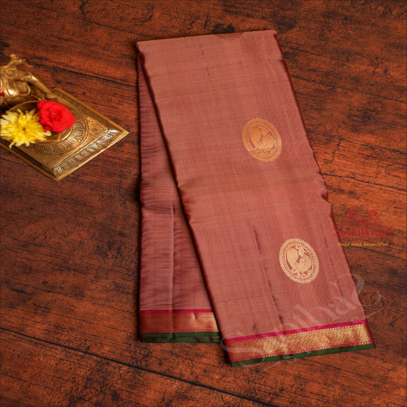 ROSY BROWN COLOUR BODY WITH GOLDEN ZARI PEACOCK MOTIFS IN CHAKRA AND CONTRAST PALLU & BLOUSE