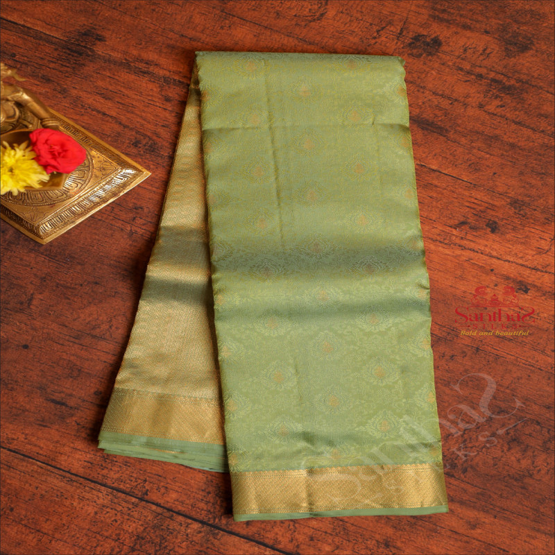 LIGHT GREEN COLOUR BODY WITH BANARAS EMBOSED DESIGN AND SELF COLOUR PALLU & BLOUSE