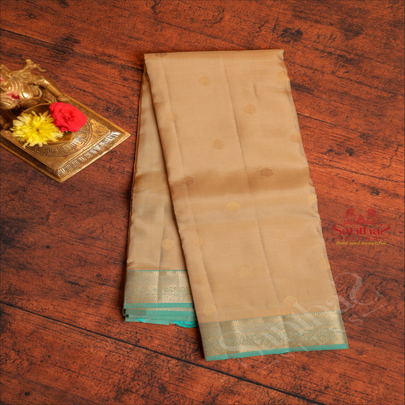 BRUSHED GOLD COLOUR BODY WITH GOLDEN ZARI BUTTAS AND CONTRAST PALLU & BLOUSE