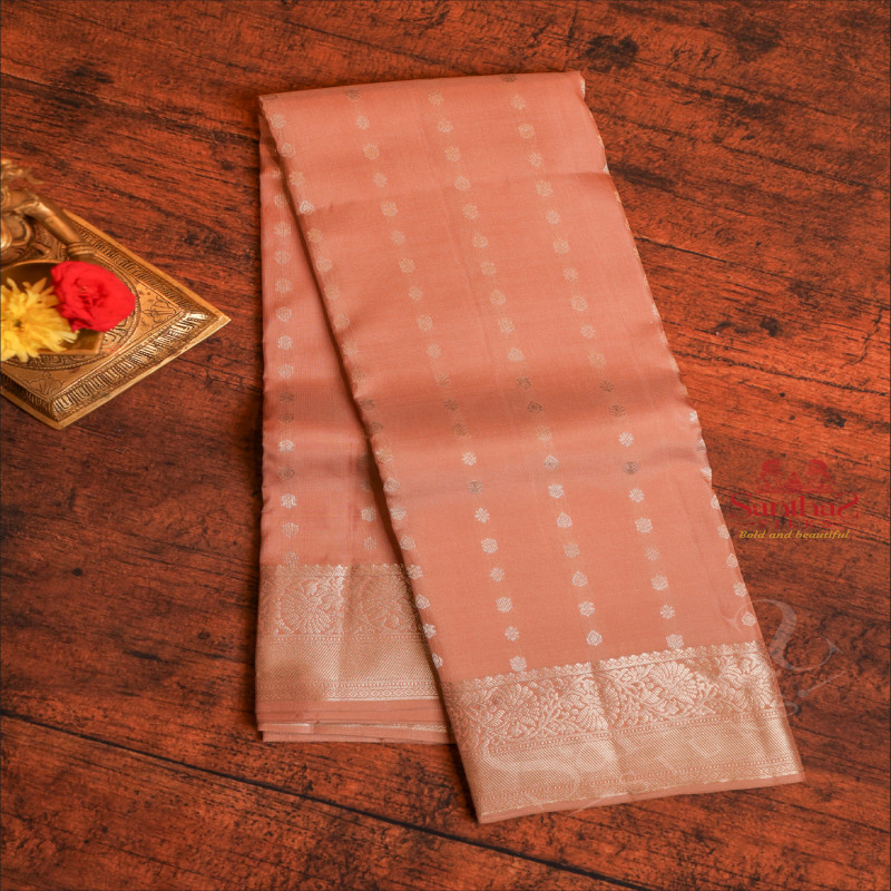 PASTEL FLESH COLOUR WITH SILVER ZARI DHIYA BUTTAS AND SELF COLOUR PALLU & CONTRAST BLOUSE