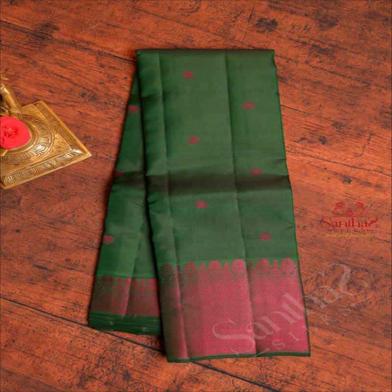 DARK GREEN COLOUR BODY WITH RANI PINK COLOUR ZARI BUTTAS AND SELF COLOUR PALLU & BLOUSE