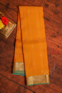 mustard-yellow-colour-body-with-golden-zari-butta-with-contrast-blouse-border