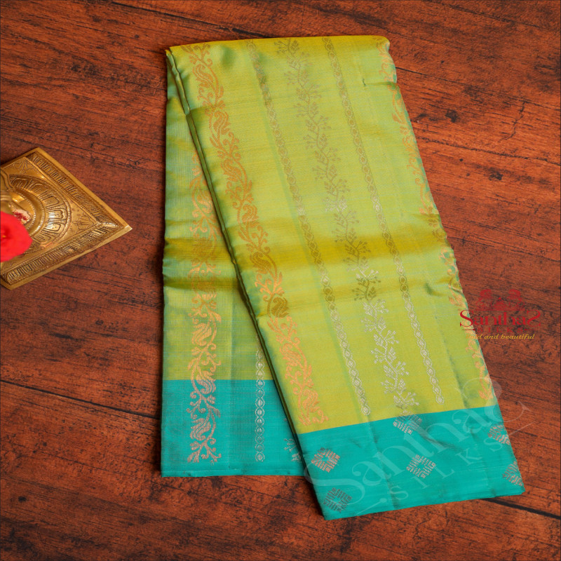 GREEN COLOUR BODY WITH COPPER & SILVER ZARI BUTTAS AND CONTRAST PALLU & BLOUSE