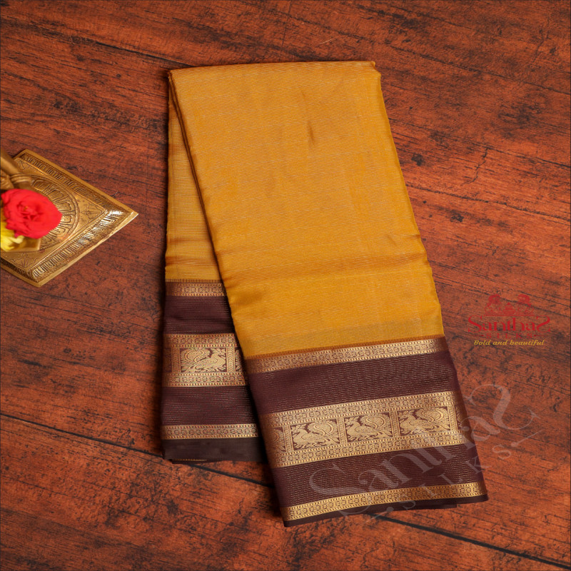 MUSTARD COLOUR BODY WITH VAIRA OOSI PATTERN STRIPS AND CONTRAST PALLU & BLOUSE