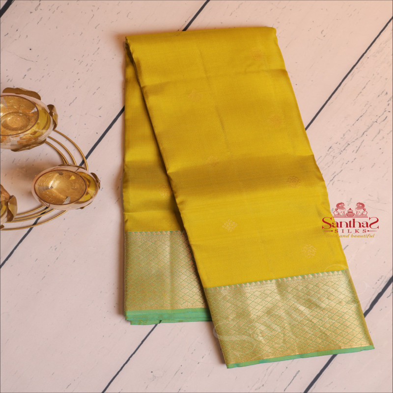 PEAR GREEN COLOUR BODY WITH GOLDEN ZARI BUTTAS AND CONTRAST PALLU & BLOUSE