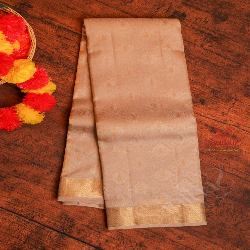 CREAM COLOUR BODY WITH GOLDEN ZARI BORDER AND BUTTA WITH SELF BLOUSE