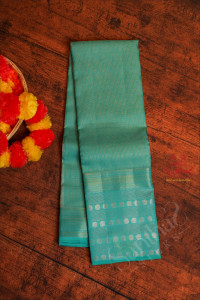 bright-turquose-blue-colour-body-with-golden-zari-small-checks-and-self-colour-pallu-blouse