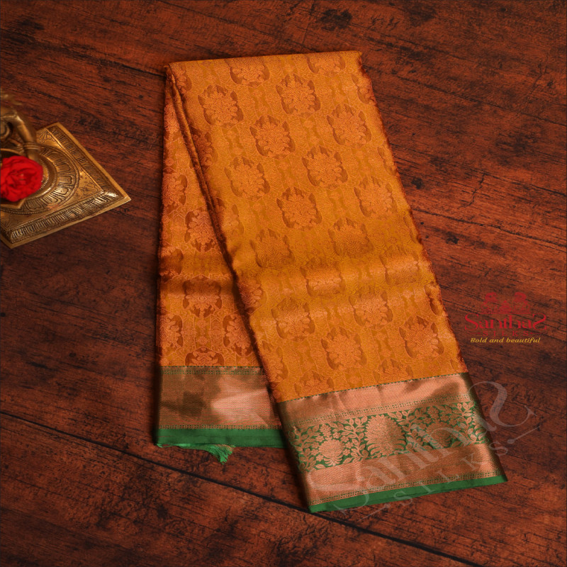 MUSTARD YELLOW COLOUR BODY WITH JACQUARD FLORAL EMBOSED WITH CONTRAST BLOUSE & BORDER
