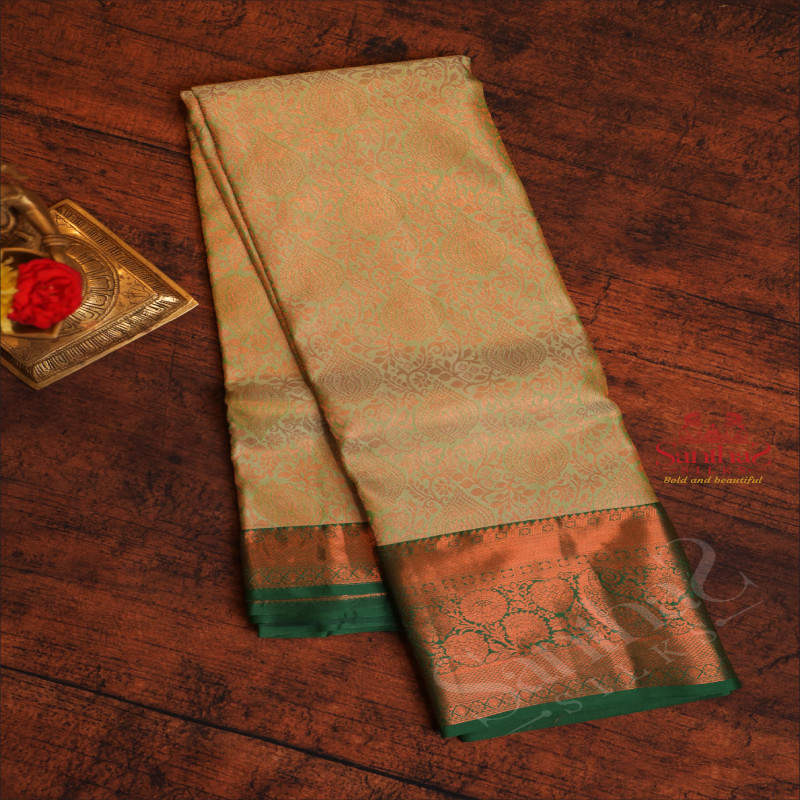 PISTHA GREEN COLOUR BODY WITH JACQUARD FLORAL EMBOSED WITH CONTRAST BLOUSE & BORDER