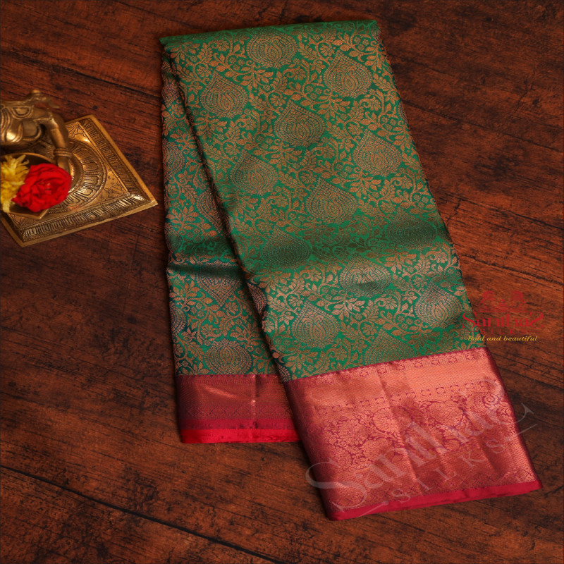 GREEN COLOUR BODY WITH JACQUARD FLORAL EMBOSED WITH CONTRAST BLOUSE & BORDER