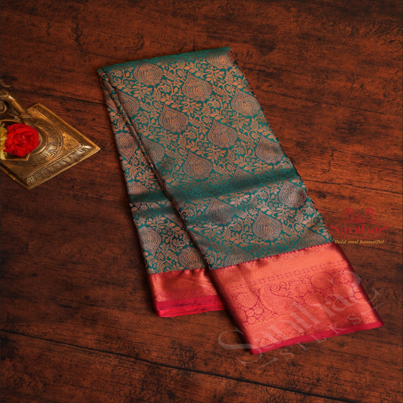 ANANTHA BLUE COLOUR BODY WITH JACQUARD FLORAL EMBOSED WITH CONTRAST BLOUSE & BORDER