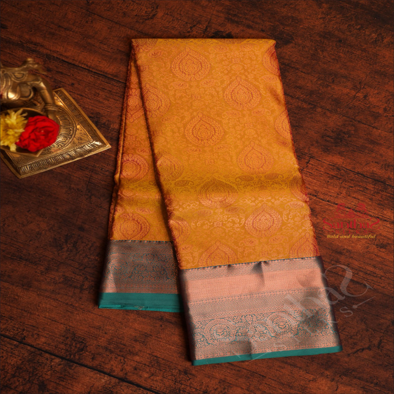 MUSTARD YELLOW COLOUR BODY WITH JACQUARD FLORAL EMBOSED WITH CONTRAST BLUE BLOUSE & BORDER