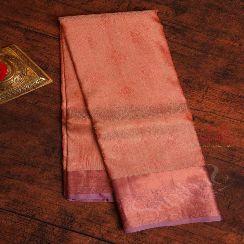 PEACH COLOUR BODY WITH JACQUARD FLORAL EMBOSED WITH CONTRAST BLOUSE & PALLU