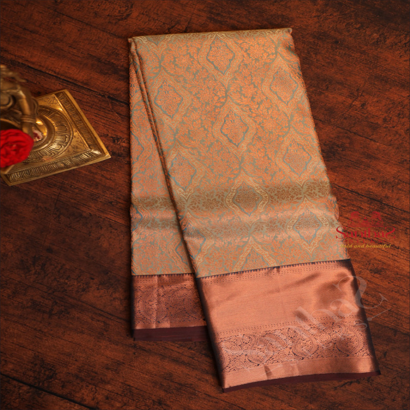 GREYISH BLUE COLOUR BODY WITH JACQUARD FLORAL EMBOSED WITH CONTRAST BLOUSE & BORDER