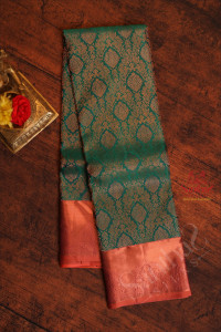 green-colour-body-with-heavy-jacquard-floral-embosed-with-contrast-blouse-border