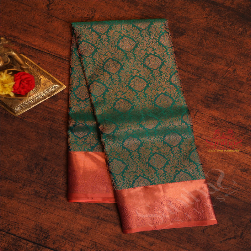 GREEN COLOUR BODY WITH HEAVY JACQUARD FLORAL EMBOSED WITH CONTRAST BLOUSE & BORDER