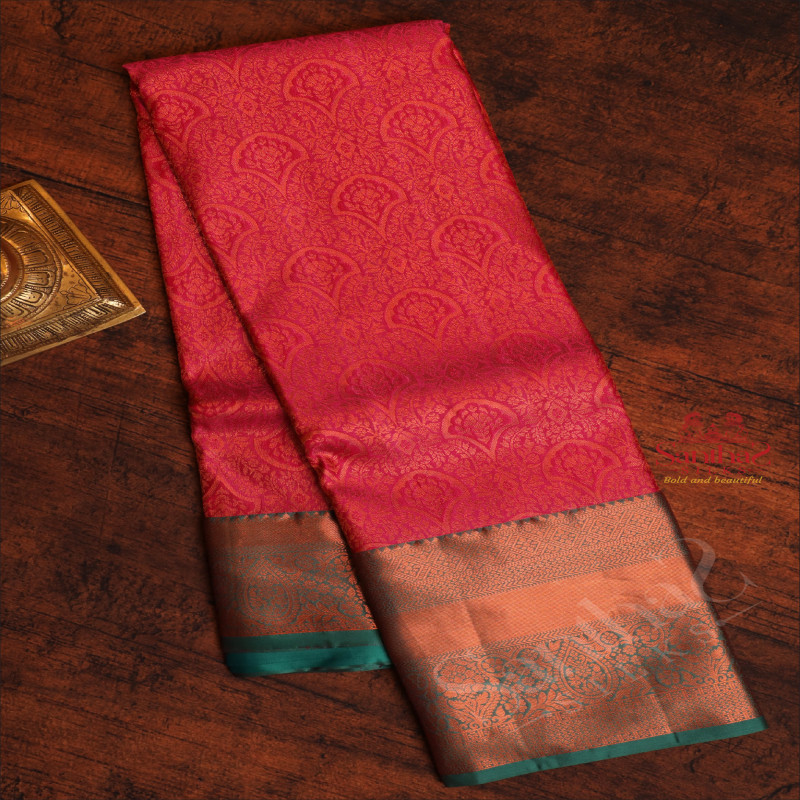 PINK COLOUR BODY WITH JACQUARD FLORAL EMBOSED WITH CONTRAST BLOUSE & BORDER