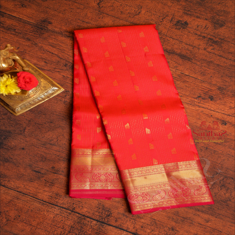 RED COLOUR BODY WITH GOLDEN ZARI STRIPS & BUTTA AND CONTRAST PALLU & BLOUSE