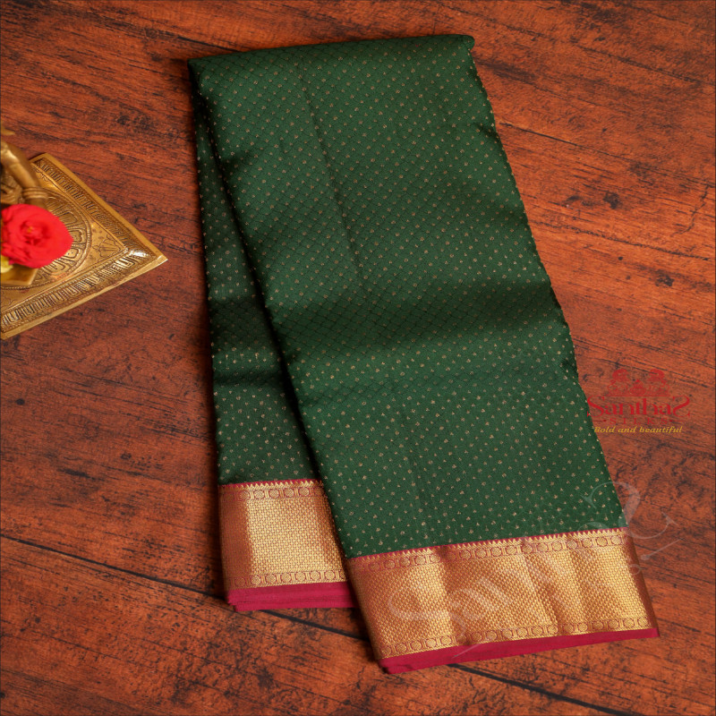 DARK GREEN COLOUR BODY WITH EMBOSED THOUSAND BUTTAS AND CONTRAST PALLU & BLOUSE