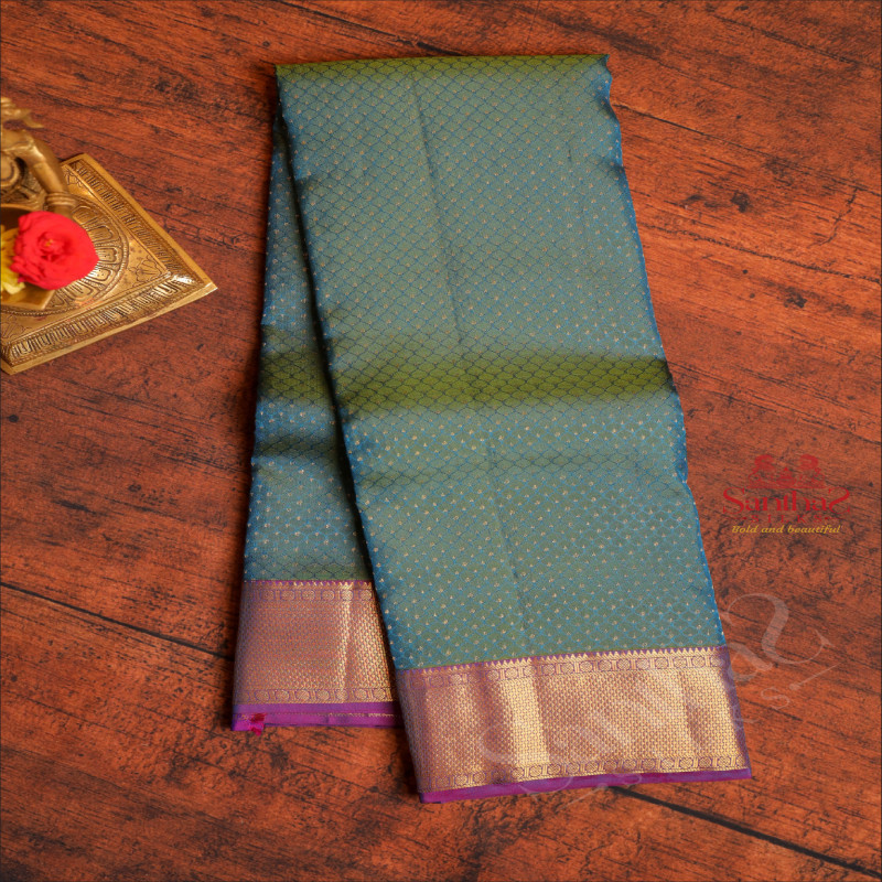 PEACOCK BLUE COLOUR BODY WITH EMBOSED THOUSAND BUTTAS AND CONTRAST PALLU & BLOUSE