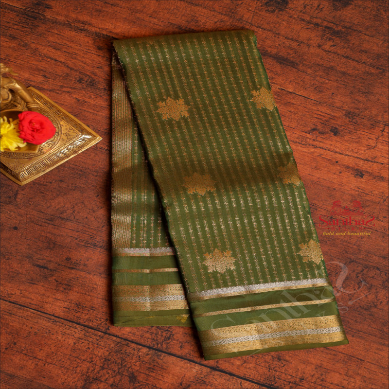 DARK MOSS GREEN COLOUR BODY WITH GOLDEN ZARI STRIPS & BUTTA AND SELF COLOUR PALLU & BLOUSE