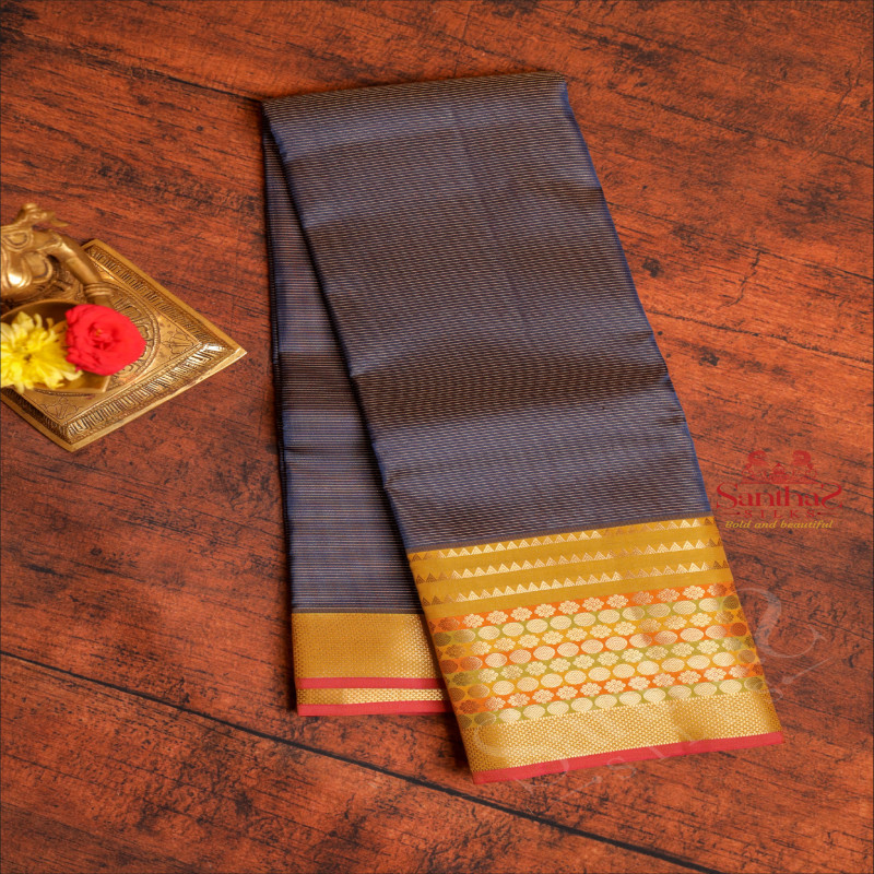 PRUSSIAN BLUE COLOUR BODY WITH GOLDEN ZARI STRIPS AND CONTRAST PALLU & BLOUSE