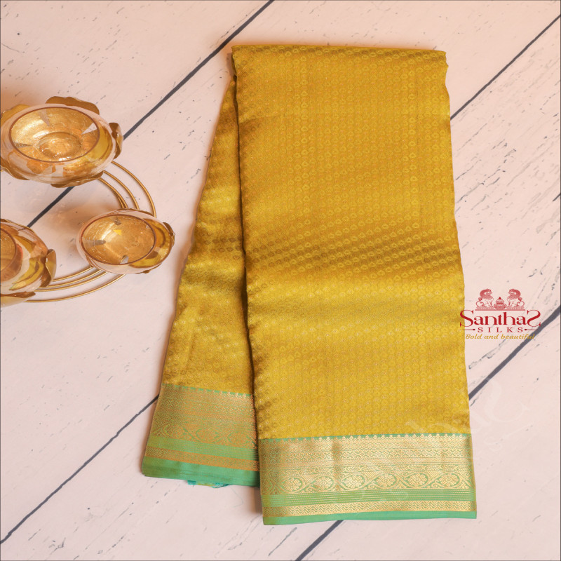 MUSTARD COLOUR BODY WITH EMBOSED DESIGN AND CONTRAST PALLU & BLOUSE