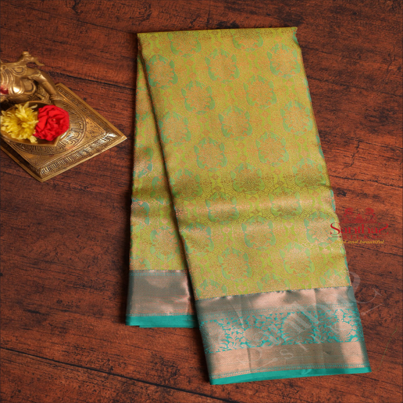 PARROT GREEN COLOUR BODY WITH JACQUARD FLORAL EMBOSED WITH CONTRAST BLOUSE & BORDER
