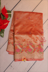 crush-material-saree-with-emboridery-work-in-orange-colour