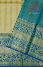 SANDAL COLOUR CHECKED BODY IN ZARI BUTTA WITH CONTRAST BLOUSE & BORDER