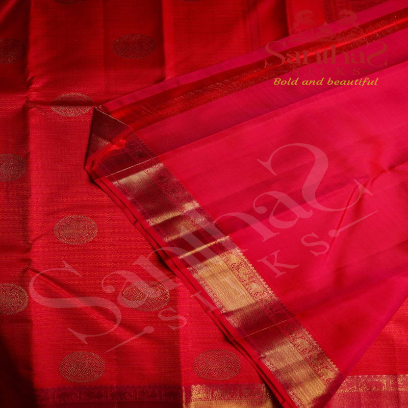 PINKISH ORANGE COLOUR IN BODY YAALI BUTTA THREAD EMBOSED WITH SELF BLOUSE & BORDER