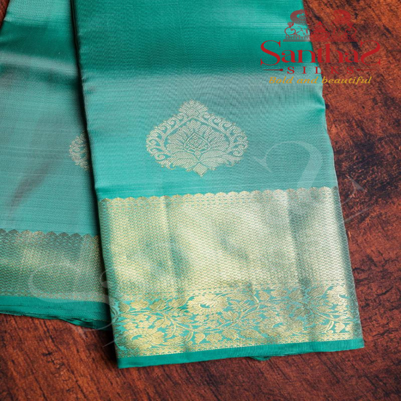 EMERALD GREEN COLOUR BODY BIG BUTTA GOLD ZARI BORDER WITH SELF BLOUSE