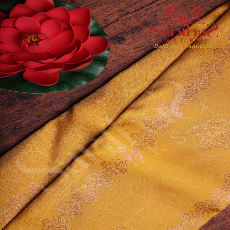 YELLOW COLOUR BODY IN COPPER ZARI BUTTA WITH CONTRAST BLOUSE & BORDER