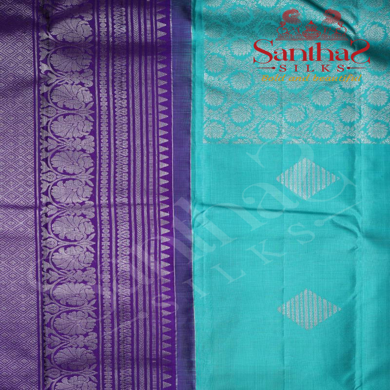 AQUAMARINE COLOUR BODY IN SILVER ZARI BUTTA WITH CONTRAST BLOUSE